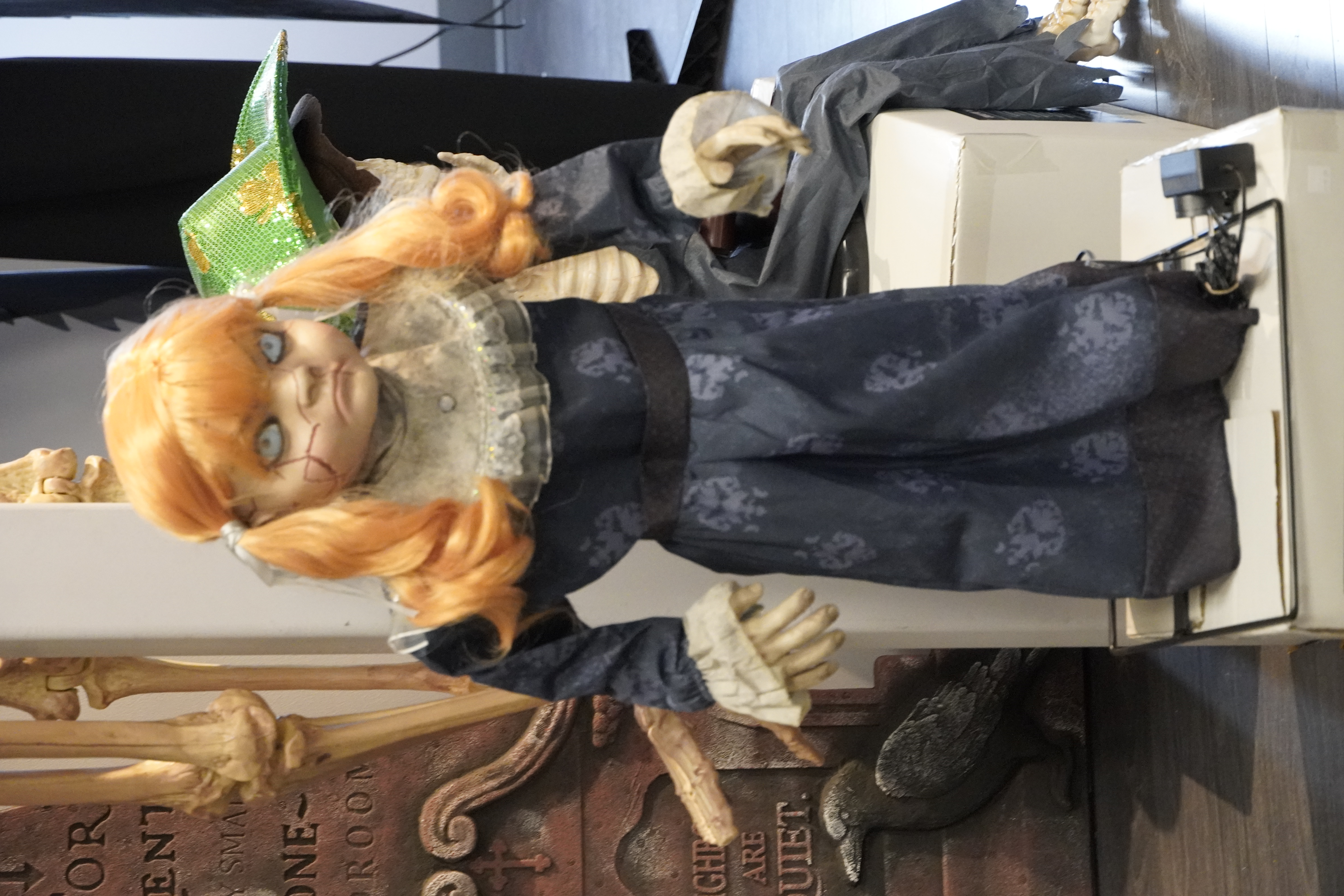 Animatronic horror props and decorations in the upstairs Twilight Zone room.